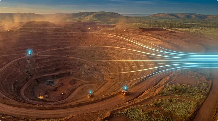 Aerial view of an open-pit mine with data stream visualizations connecting key points across the operation